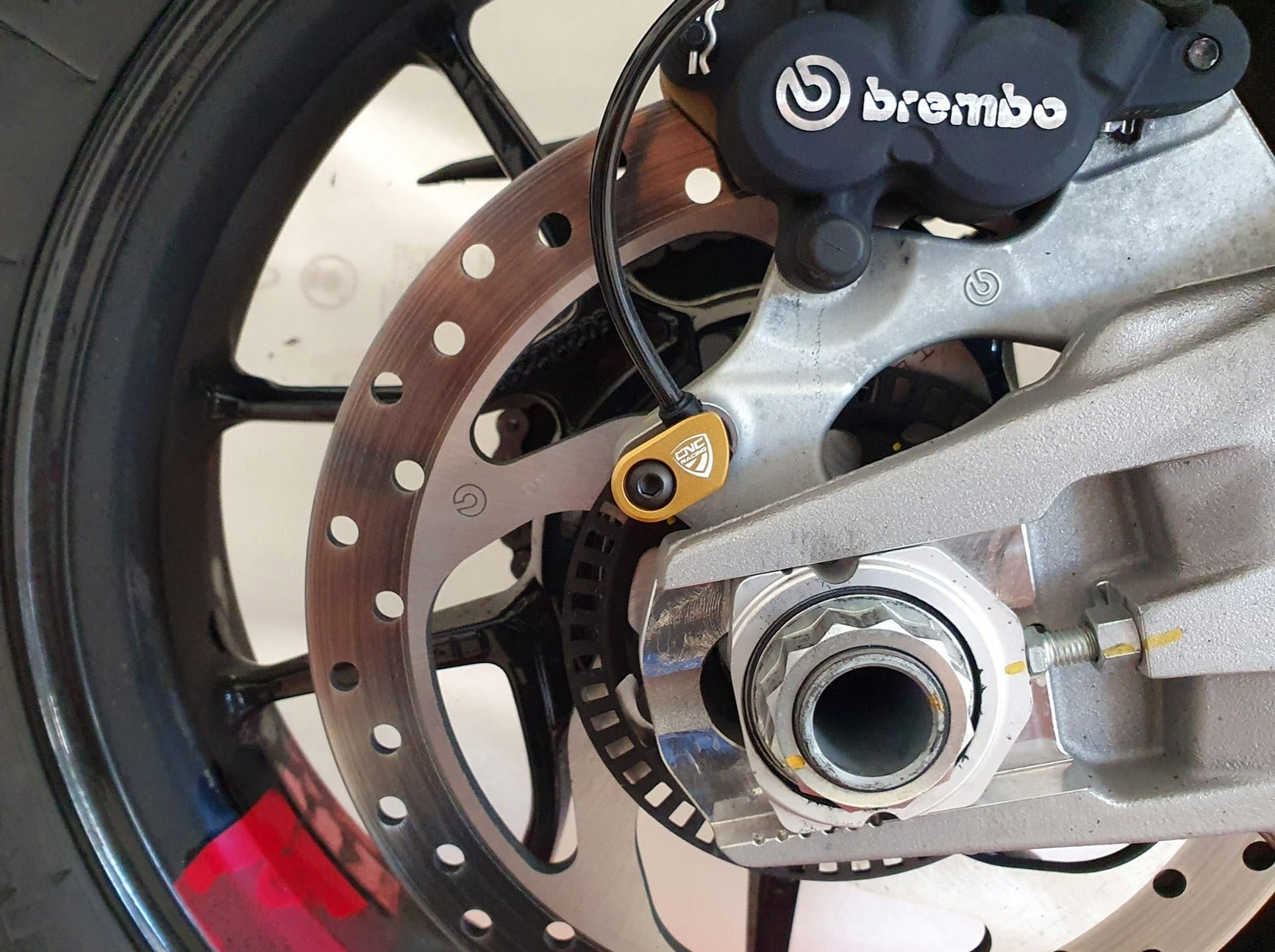 PR201 - CNC RACING Ducati Steel ABS Sensor Protection – Accessories in the Factory Racing Motorcycle Aftermarket Accessories and Parts Online Shop