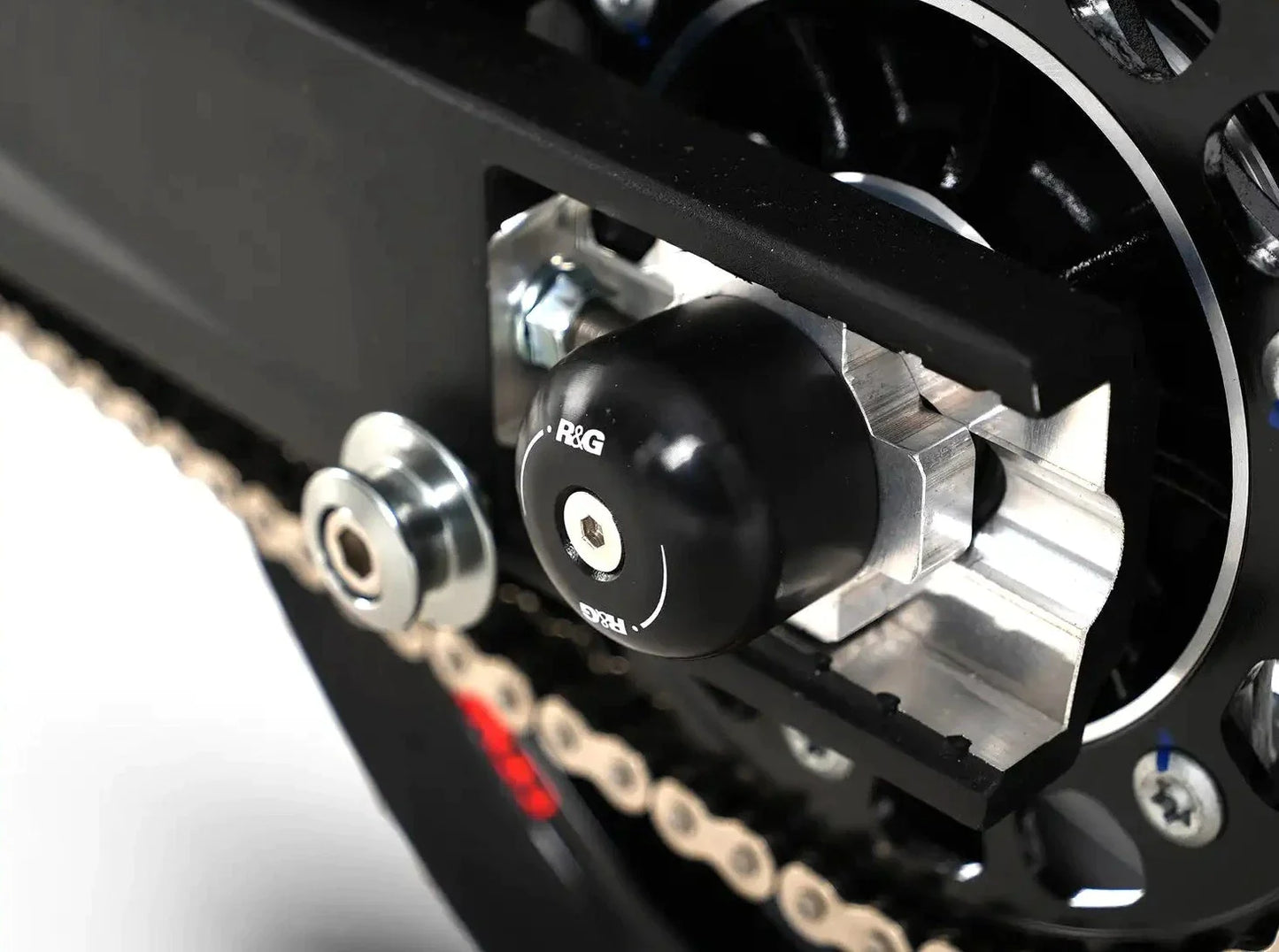 SP0081 - R&G RACING CFMoto / KTM Rear Wheel Sliders (swingarm)