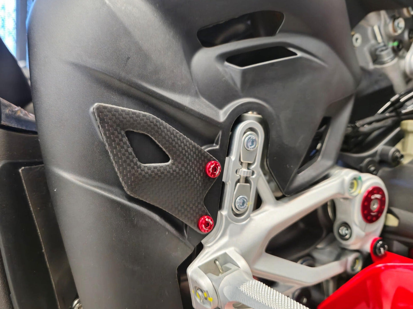CNC RACING ZA412 Ducati Panigale V4 (2025+) Carbon Heel Guard Kit – Accessories in the Factory Racing Motorcycle Aftermarket Accessories and Parts Online Shop